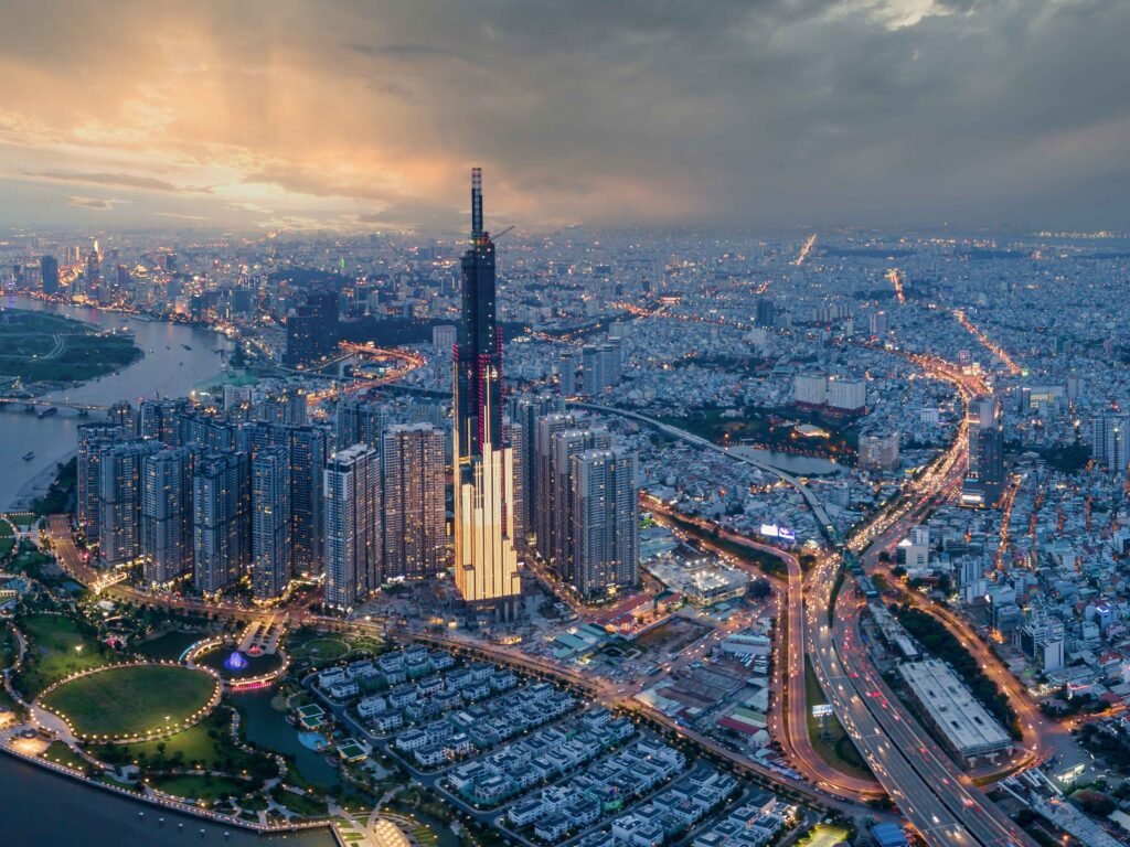 Nighttime skyline of Ho Chi Minh City with Landmark 81 and Saigon River